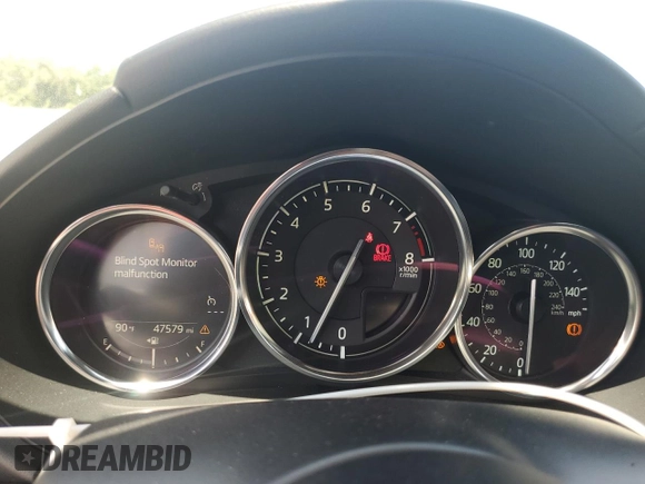 2020 Mazda MX-5 Miata Grand Touring z VIN JM1NDAD77L0414873, wystawiony jako Copart lot #54767785 z przebiegiem 47 579 mil mil oraz Szkoda całkowita • Salvage title. Historia ofert i sprzedaży dostępna na DreamBid. Obrazek 9.