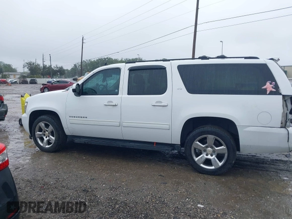 2014 Chevrolet Suburban LT with VIN 1GNSCJE06ER154639, listed as a IAAI auction lot 41410623 with 213,592 mi miles. Bid and sale history available at carsss.com. Image 14.