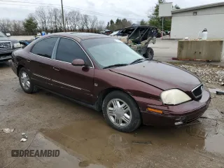 2000 Mercury Sable LS Premium with VIN 1MEFM55S0YA606201, listed as a Copart auction lot 43451915 with 101,294 mi miles and Salvage Title. Bid and sale history available at carsss.com. Image 4.