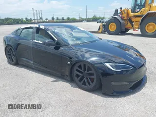 2022 Tesla Model S Plaid with VIN 5YJSA1E64NF472655, listed as a IAAI auction lot 40325698 with Not provided miles and . Bid and sale history available at DreamBid. Image 1.