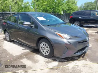 2016 Toyota Prius Two z VIN JTDKBRFU2G3014010, wystawiony jako IAAI lot #42254617 z przebiegiem 171 521 mil mil oraz . Historia ofert i sprzedaży dostępna na DreamBid. Obrazek 1.