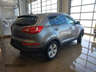 2012 Kia Sportage LX with VIN KNDPB3A23C7317650, listed as a IAAI auction lot 41631193 with 96,433 mi miles. Bid and sale history available at carsss.com. Image 4.