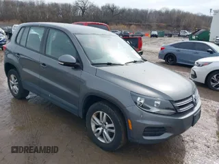 2014 Volkswagen Tiguan SE z VIN WVGBV3AX5EW503417, wystawiony jako IAAI lot #41658143 z przebiegiem 145 509 mil mil oraz . Historia ofert i sprzedaży dostępna na DreamBid. Obrazek 1.