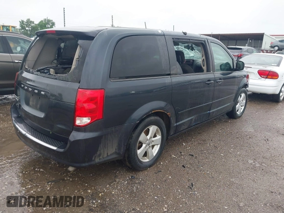 2013 Dodge Grand Caravan SE with VIN 2C4RDGBG8DR736291, listed as a IAAI auction lot 42161396 with Not Provided miles and . Bid and sale history available at DreamBid. Image 4.