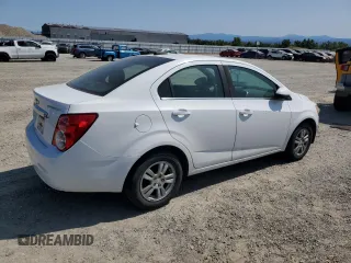 2016 Chevrolet Sonic LT z VIN 1G1JC5SH9G4134576, wystawiony jako Copart lot #58660555 z przebiegiem 127 067 mil mil oraz Czysty tytuł • Clean title. Historia ofert i sprzedaży dostępna na DreamBid. Obrazek 3.