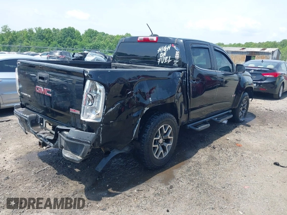 2016 GMC Canyon 4WD SLE z VIN 1GTG6CE35G1171168, wystawiony jako IAAI lot #42275447 z przebiegiem 171 581 mil mil oraz . Historia ofert i sprzedaży dostępna na DreamBid. Obrazek 4.