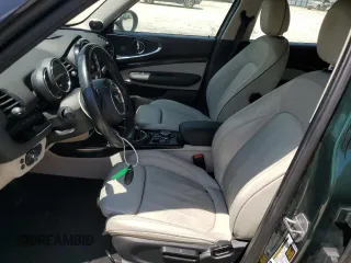 2016 MINI Clubman z VIN WMWLN5C5XG2E29275, wystawiony jako Copart lot #68162014 z przebiegiem 79 754 mil mil oraz Nie do naprawy. Historia ofert i sprzedaży dostępna na DreamBid. Obrazek 7.