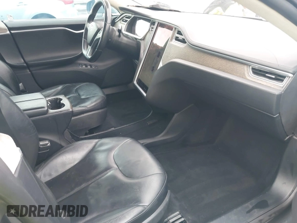 2013 Tesla Model S с VIN 5YJSA1CG5DFP06411, выставлен на аукционе IAAI как лот 41079914 с пробегом 266 968 миль миль и . История ставок и продаж доступна на DreamBid. Изображение 5.