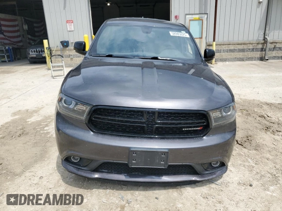2015 Dodge Durango Limited with VIN 1C4RDJDG0FC904897, listed as a Copart auction lot 58985025 with 147,139 mi miles and Salvage title. Bid and sale history available at DreamBid. Image 5.