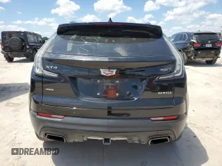 2021 Cadillac XT4 AWD Sport with VIN 1GYFZFR43MF054379, listed as a Copart auction lot 55338315 with 53,693 mi miles and Salvage title. Bid and sale history available at DreamBid. Image 6.