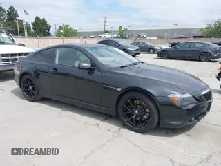 2006 BMW 6 Series 650Ci with VIN WBAEH13436CR50523, listed as a IAAI auction lot 42046873 with 111,765 mi miles. Bid and sale history available at carsss.com. Image 1.