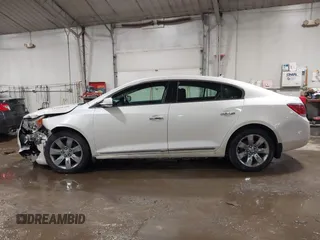 2013 Buick LaCrosse Leather z VIN 1G4GL5E31DF157332, wystawiony jako IAAI lot #41434061 z przebiegiem 153 426 mil mil oraz . Historia ofert i sprzedaży dostępna na DreamBid. Obrazek 14.