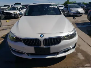 2018 BMW 3 Series 330i xDrive with VIN WBA8Z9C53JB219879, listed as a Copart auction lot 57744634 with 139,986 mi miles and Salvage Title. Bid and sale history available at carsss.com. Image 5.
