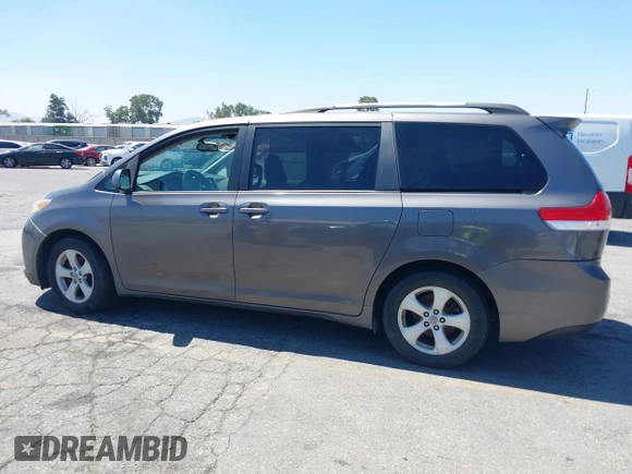 2011 Toyota Sienna LE AAS with VIN 5TDKK3DC4BS056872, listed as a IAAI auction lot 42643417 with 170,266 mi miles and . Bid and sale history available at DreamBid. Image 14.