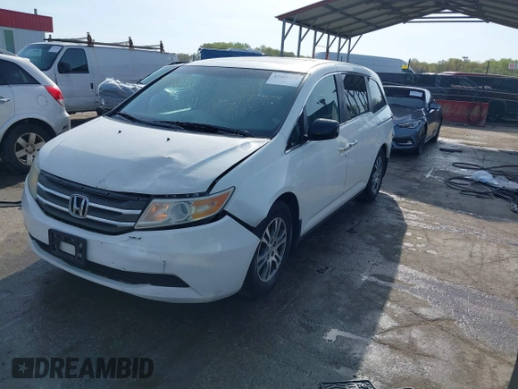2011 Honda Odyssey EX-L with VIN 5FNRL5H6XBB059162, listed as a IAAI auction lot 42061378 with 164,317 mi miles and . Bid and sale history available at carsss.com. Image 19.