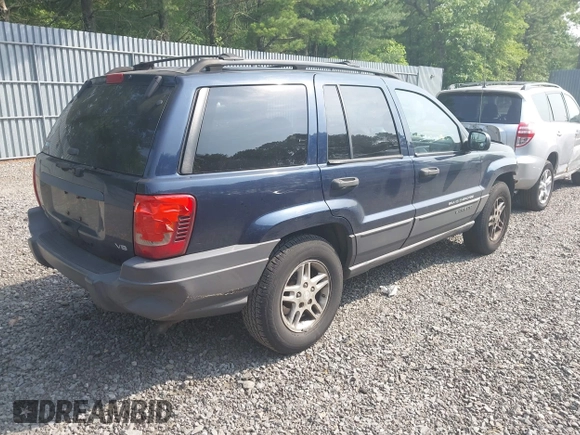 2004 Jeep Grand Cherokee Laredo with VIN 1J4GW48NX4C405558, listed as a IAAI auction lot 42440639 with 197,457 mi miles and . Bid and sale history available at DreamBid. Image 4.