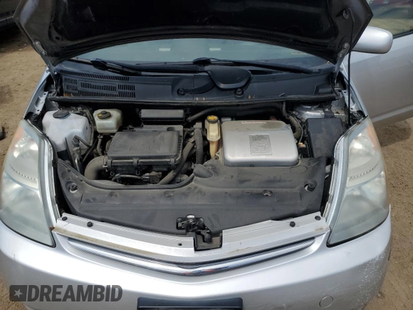 2007 Toyota Prius z VIN JTDKB20U377090358, wystawiony jako Copart lot #56599325 z przebiegiem 152 754 mil mil oraz Szkoda całkowita • Salvage title. Historia ofert i sprzedaży dostępna na DreamBid. Obrazek 11.
