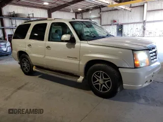 2005 Cadillac Escalade z VIN 1GYEK63N95R244477, wystawiony jako Copart lot #60168275 z przebiegiem 207 957 mil mil oraz Czysty tytuł • Clean title. Historia ofert i sprzedaży dostępna na DreamBid. Obrazek 4.