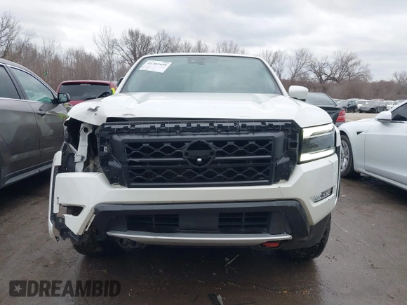 2022 Nissan Frontier SV z VIN 1N6ED1EJ2NN646035, wystawiony jako IAAI lot #41702459 z przebiegiem 93 030 mil mil oraz . Historia ofert i sprzedaży dostępna na DreamBid. Obrazek 13.