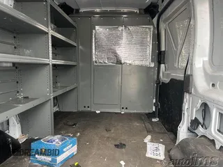 2021 Ford Transit Cargo with VIN 1FTYE1C89MKA78153, listed as a IAAI auction lot 42835600 with 88,619 mi miles and . Bid and sale history available at DreamBid. Image 6.