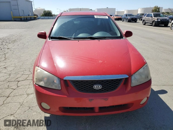 2005 Kia Spectra with VIN KNAFE162455069422, listed as a Copart auction lot 52999455 with 249,774 mi miles and Salvage Title. Bid and sale history available at carsss.com. Image 5.
