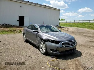 2013 Ford Taurus Limited z VIN 1FAHP2F81DG229944, wystawiony jako Copart lot #63218315 z przebiegiem 199 897 mil mil oraz Czysty tytuł • Clean title. Historia ofert i sprzedaży dostępna na DreamBid. Obrazek 13.