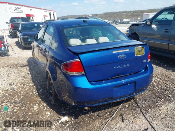 2009 Ford Focus SE with VIN 1FAHP35N59W257031, listed as a IAAI auction lot 41887905 with 192,591 mi miles. Bid and sale history available at carsss.com. Image 3.