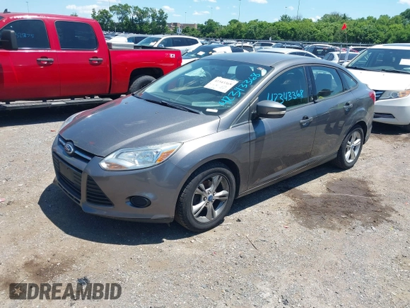2013 Ford Focus SE z VIN 1FADP3F20DL235001, wystawiony jako IAAI lot #42343368 z przebiegiem 202 356 mil mil oraz . Historia ofert i sprzedaży dostępna na DreamBid. Obrazek 2.