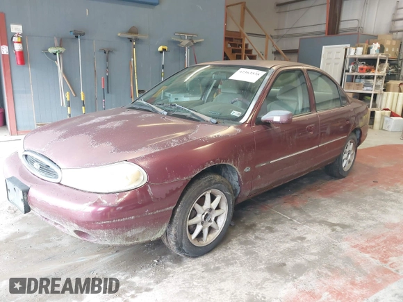 1999 Ford Contour SE z VIN 1FAFP6639XK144984, wystawiony jako IAAI lot #42363538 z przebiegiem 160 891 mil mil oraz . Historia ofert i sprzedaży dostępna na DreamBid. Obrazek 2.