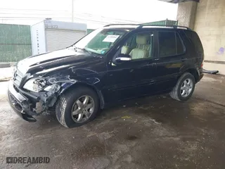 2003 Mercedes-Benz M-Class with VIN 4JGAB75E23A442364, listed as a IAAI auction lot 41958964 with 221,174 mi miles. Bid and sale history available at carsss.com. Image 2.