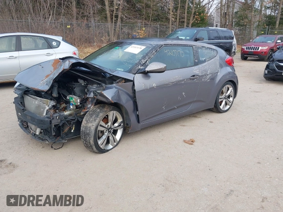 2014 Hyundai Veloster with VIN KMHTC6AD5EU183478, listed as a IAAI auction lot 42107170 with 64,905 mi miles. Bid and sale history available at carsss.com. Image 2.