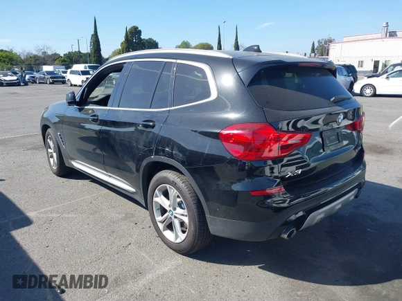 2019 BMW X3 sDrive30i with VIN 5UXTR7C5XKLR51471, listed as a IAAI auction lot 41718818 with 52,670 mi miles. Bid and sale history available at carsss.com. Image 3.