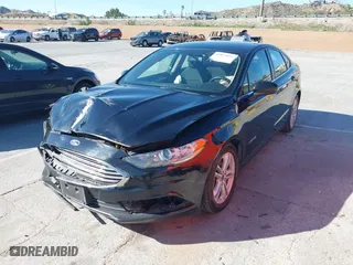 2018 Ford Fusion Hybrid SE with VIN 3FA6P0LU5JR257120, listed as a IAAI auction lot 41859050 with 142,524 mi miles. Bid and sale history available at carsss.com. Image 17.
