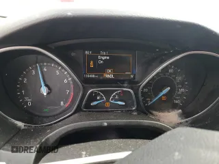 2017 Ford Focus SE with VIN 1FADP3F23HL328312, listed as a Copart auction lot 57028125 with 116,498 mi miles and Salvage title. Bid and sale history available at DreamBid. Image 9.