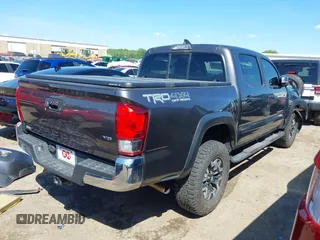 2016 Toyota Tacoma SR with VIN 5TFCZ5AN6GX032026, listed as a IAAI auction lot 42091523 with 159,259 mi miles and . Bid and sale history available at carsss.com. Image 4.