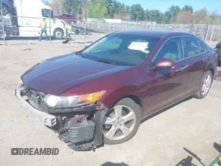 2010 Acura TSX z VIN JH4CU2F60AC011281, wystawiony jako IAAI lot #42148547 z przebiegiem 122 761 mil mil oraz . Historia ofert i sprzedaży dostępna na DreamBid. Obrazek 2.