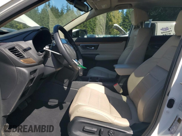 2018 Honda CR-V Touring with VIN 2HKRW2H9XJH619830, listed as a Copart auction lot 53694675 with 95,703 mi miles and Salvage title. Bid and sale history available at DreamBid. Image 7.