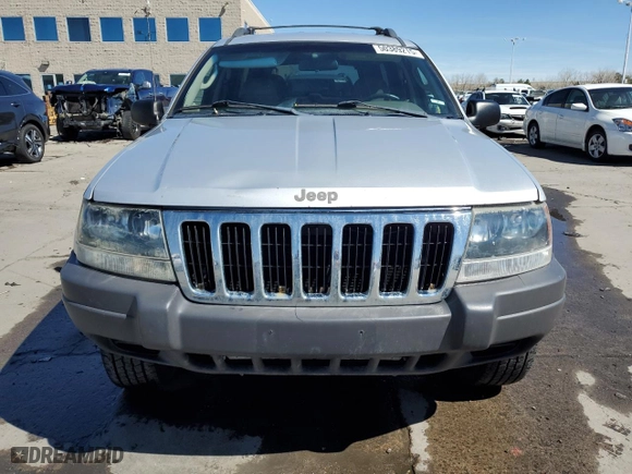 2003 Jeep Grand Cherokee Laredo with VIN 1J4GW48S13C556129, listed as a Copart auction lot 50389215 with 193,934 mi miles and Salvage Title. Bid and sale history available at carsss.com. Image 5.