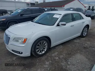 2012 Chrysler 300 Limited with VIN 2C3CCACG5CH129861, listed as a IAAI auction lot 41891121 with 146,141 mi miles. Bid and sale history available at carsss.com. Image 2.