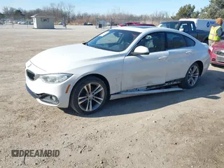 2016 BMW 4 Series 428i xDrive with VIN WBA4C9C59GG138090, listed as a IAAI auction lot 41560267 with 94,010 mi miles and . Bid and sale history available at carsss.com. Image 17.
