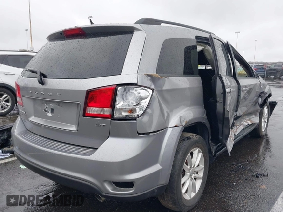 2016 Dodge Journey SXT with VIN 3C4PDDBG7GT173158, listed as a IAAI auction lot 42020182 with 159,136 mi miles. Bid and sale history available at carsss.com. Image 4.