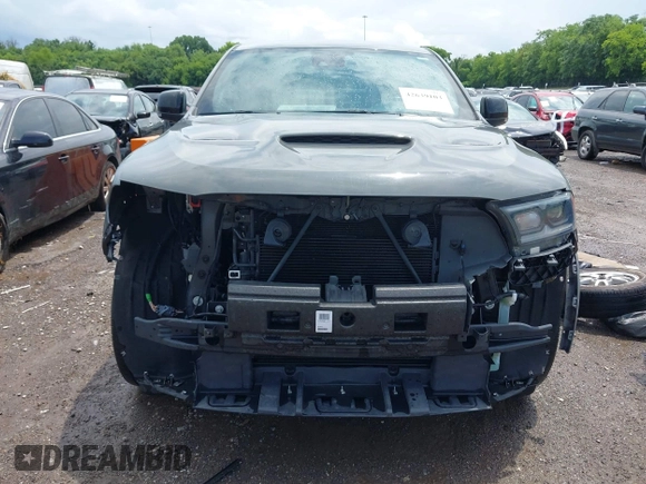 2022 Dodge Durango GT Plus with VIN 1C4RDJDG1NC213263, listed as a IAAI auction lot 42639103 with 77,061 mi miles and . Bid and sale history available at DreamBid. Image 6.