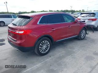 2016 Lincoln MKX Select z VIN 2LMTJ6KR3GBL55200, wystawiony jako IAAI lot #42091854 z przebiegiem 74 426 mil mil oraz . Historia ofert i sprzedaży dostępna na DreamBid. Obrazek 4.