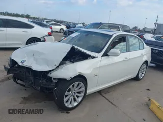 2011 BMW 3 Series 328i xDrive with VIN WBAPK7C50BA970837, listed as a IAAI auction lot 41224747 with 152,125 mi miles. Bid and sale history available at carsss.com. Image 2.