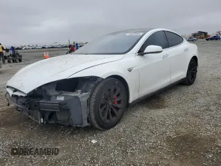 2014 Tesla Model S 60 with VIN 5YJSA1H19EFP52457, listed as a Copart auction lot 59589905 with 167,662 mi miles and Salvage title. Bid and sale history available at DreamBid. Image 1.