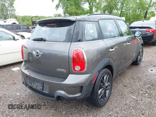2011 MINI Countryman S with VIN WMWZC5C53BWM11022, listed as a IAAI auction lot 42249403 with 173,718 mi miles and . Bid and sale history available at DreamBid. Image 4.