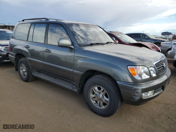 2001 Lexus LX 470 with VIN JTJHT00W313509544, listed as a Copart auction lot 69942924 with 174,635 mi miles and Clean Title. Bid and sale history available at carsss.com. Image 4.