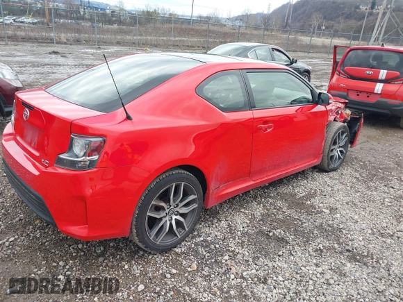 2014 Scion tC z VIN JTKJF5C76E3078810, wystawiony jako IAAI lot #41638613 z przebiegiem 76 648 mil mil oraz . Historia ofert i sprzedaży dostępna na DreamBid. Obrazek 4.