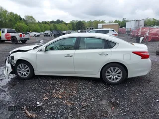 2016 Nissan Altima SR with VIN 1N4AL3AP7GC205080, listed as a IAAI auction lot 41974212 with 61,858 mi miles and . Bid and sale history available at DreamBid. Image 14.