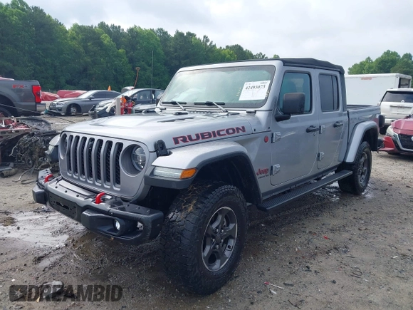 2020 Jeep Gladiator Rubicon z VIN 1C6JJTBG7LL181833, wystawiony jako IAAI lot #42493073 z przebiegiem 13 775 mil mil oraz . Historia ofert i sprzedaży dostępna na DreamBid. Obrazek 2.